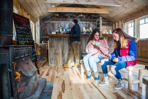 kylie and friend in warming hut